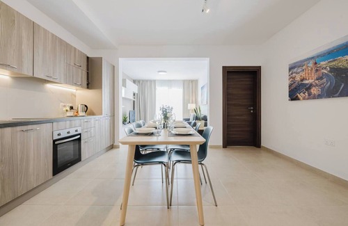Mellieħa Heights Apartment | This modern designed apartment is a self-catering accommodation located in a residential area of Mellieha but surrounded with all amenities, the bus terminus is just a five minutes walk from the apartment. From this bus terminus you can catch a bus t