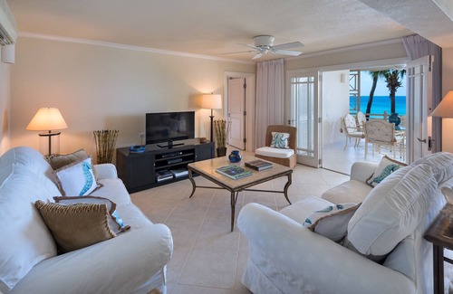 Reeds Bay Condo | This Penthouse is situated directly on a beautiful sandy beach and has a wonderful roof deck terrace
