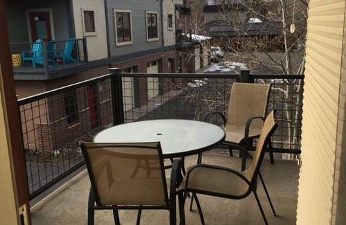 Salida Condo | This riverfront downtown condo boasts and open floor plan for kitchen, living room, and dining areas. Or step onto the balcony over the Arkansas River to hear the water rushing by. Oversized master suite has its own balcony and indoor sitting area.
