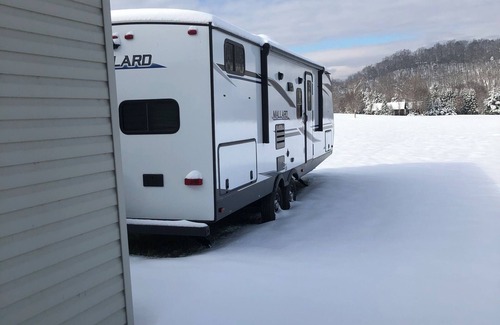 Fishers Hill House | This RV will accommodate 4 adults or two adults and 3-4 kids.