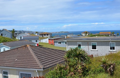 Hayle Apartment | This snug chalet is just a short walk from three miles of sandy surf.