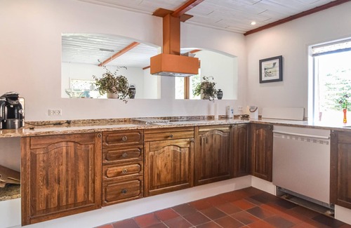 Varde House | This vacation home is located directly in the forest, yet close to the town of Varde.