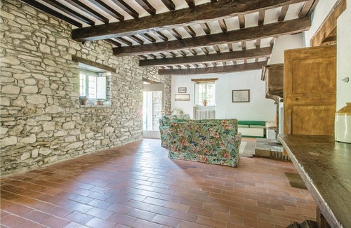 Apecchio House | This vacation home, a former farmhouse, is surrounded by lush woods and is located on a 20-hectare p