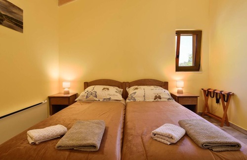 Vrlika House | This vacation home with pool offers you a pleasant stay with views of the mountains and nature.