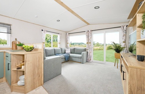 Aberystwyth House | Three bedroom caravan, sleeping six people, perfect for relaxing by the coast.