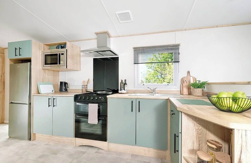 Aberystwyth House | Three bedroom caravan, sleeping six people, perfect for relaxing by the coast.