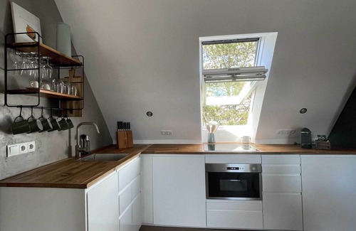 Wittduen Apartment | TIDE4 Amrum No. 6 - Modern apartment with fireplace 100m to the sea, dogs welcome