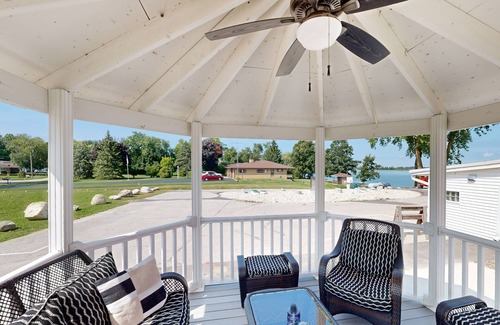 Campbellsport Condo | Tiki Beach Condo, with stunning lake views, beach access & bar/restaurant onsite