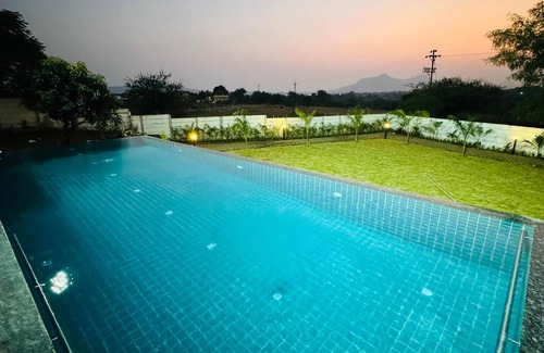 Nashik Villa | Tikona Villa 4BHK Luxury Villa in Pimplad Nashik with WiFi, AC, Swimming Pool