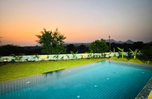 Nashik Villa | Tikona Villa 4BHK Luxury Villa in Pimplad Nashik with WiFi, AC, Swimming Pool