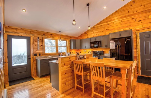 Oquossoc House | Timber Overlook - New construction log cabin with views of Rangeley Lake!