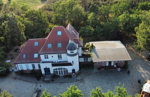 Bornicke House | Time out in a beautiful old train station on the edge of the forest in a large loft