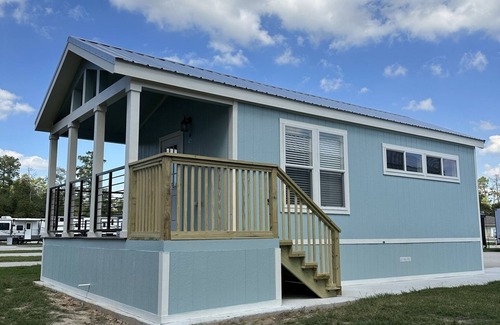 New Caney Cottage | Tiny Home Big Amenities: pool/hot tub, laundry, camp store, near Houston