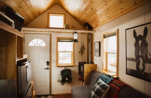 Meeker House | Tiny Home built by Rocky Mountain Tiny Homes in Durango, Colorado. It contains a Queen bed in a loft with stairs. Sleeps: 2 Pets: Max 2 Please note, this home does have a sleeping area in a loft. If you require an accommodation with more accessibilit