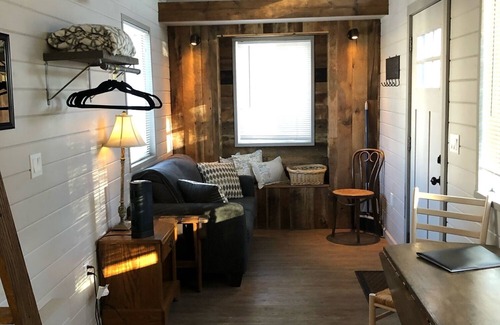 Montrose House | Tiny home located beside a creek.