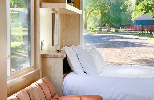 Montrose House | Tiny home with one queen bed and full size futon.