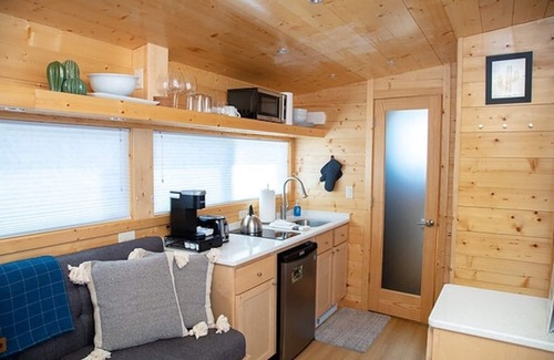 Meeker House | Tiny home with one queen bed and fold out couch all on main floor. Sleeps: 3