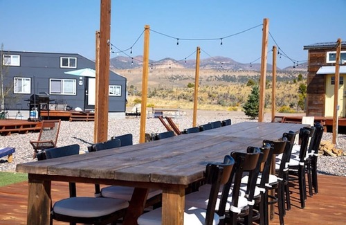 Meeker House | Tiny home with one queen bed and fold out couch all on main floor. Sleeps: 3