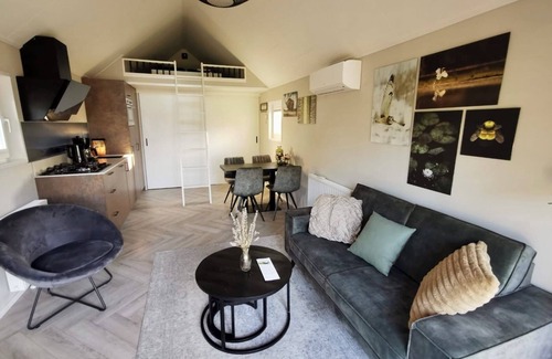 Rheden House | Tiny house time-out with lake view. In Holland, quiet, comfortable, right on the water.
