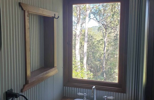 Bollier Cabin | Tiny in The Treesn- Cute, Spacious Tiny House set privately amongst the trees.n