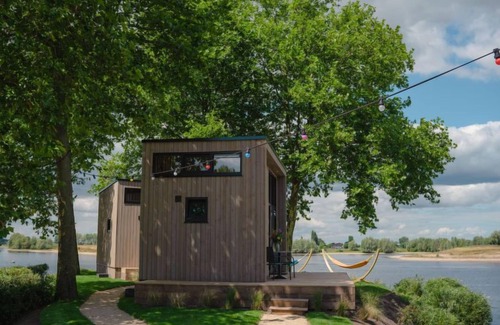 Maurik House | Tiny River House by Interhome