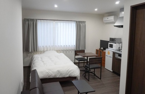 Awaji Apartment | Tiz wanAkashi Kaikyo BridgeRoad stationBeachCo / Awaji Hyōgo