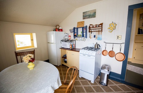 Hays Apartment | Top Floor Historic Limestone Property Downtown