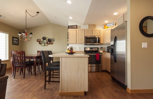 Chelan Condo | Top Floor Lake View Unit. Walking distance to town & lake. Shared pool & hot tub