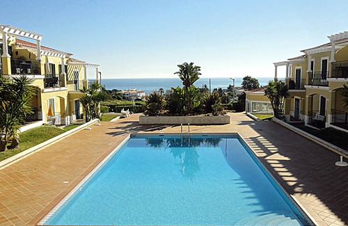 Alporchinhos Apartment | Top Floor Luxury Apt, A/C, WiFi, Prime Position with Ocean & Pool View. Sleeps 4