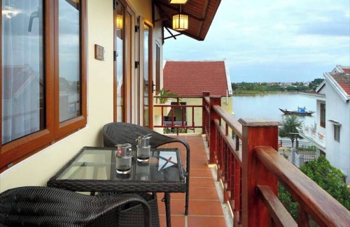 Hoi An Apartment | Top floor One-bedroom Suite overlooking lazy river