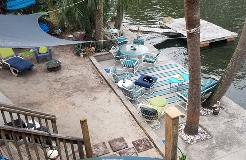 Driftwood Isles House | Top Floor Tropical Tree-house Waterfront Gulf & natural springs wildlife retreat