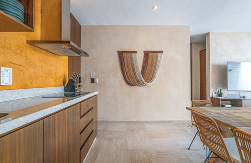 Tankah Apartment | Top level apartment with jacuzzi, shared pool, gym, & tennis courts