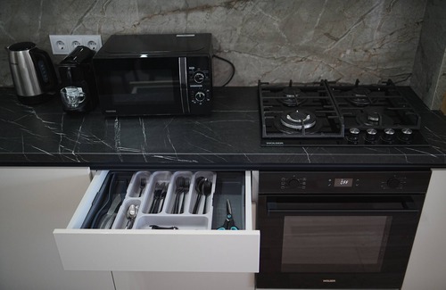 Riscani Apartment | Top Spot in Riscani! 1BR Near Shops & Restaurants