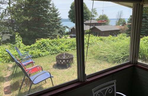 Kewadin Cottage | Torch Lake Village Cozy Cottage with private dock