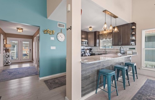 Fort Morgan House | Totally renovated 4 bedroom, 3 bath gulf front home with nice covered deck and large sun room.