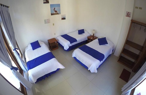 Puerto Villamil House | Tour to volcan, swim with sharks! Tripple Room Suite #2