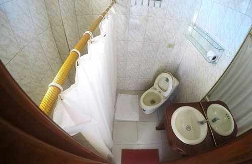 Puerto Villamil House | Tour to volcan, swim with sharks! Tripple Room Suite #3