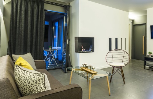 Penteli Apartment | Tourelle. A 64 m2 apartment consisting of a bedroom and a living room.