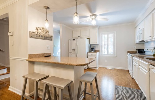 Historic District House | Townhome steps from Main St. with private backyard patio & parking