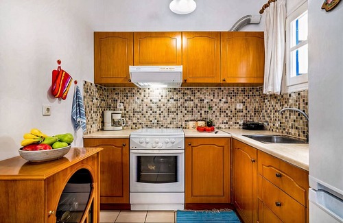 Korfalonas House | Traditional Blue house 150m from the beach with all the essentials