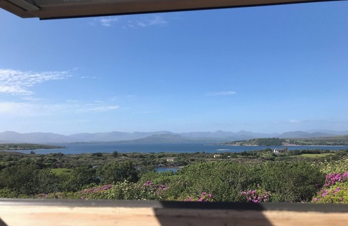 Lauragh Cottage | Traditional cosy stone cottage with sea views