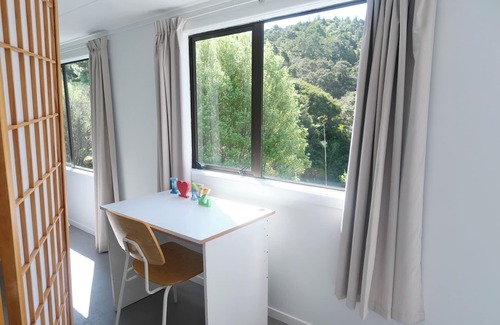 Titirangi Cottage | Tranquil Bush Living- on the 'Fringe of Heaven'