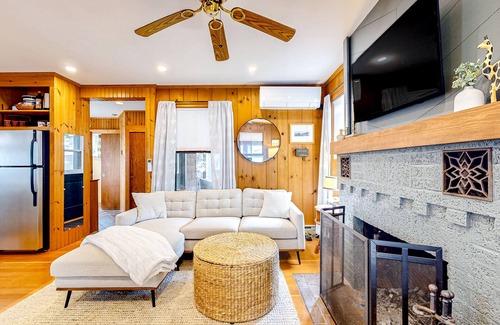 Raymond Cottage | Tranquil cottage near beach with private dock, spacious patio & modern comforts