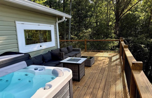 Ranger Cabin | Tranquil Escape: Hot Tub, Scenic Views, Family Fun