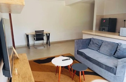 Kampala Apartment | Tranquil Escape-Wandegeya,Kampala: central and accessible.