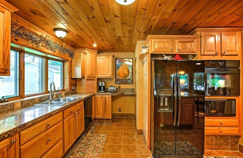 Branch House | Tranquil Lakefront Log Home with Fireplace, Private Dock and Hot Tub!