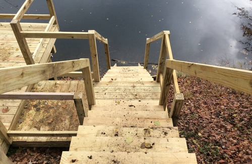 Wells House | Tranquil lakefront home sits above the lake with an unobstructed view