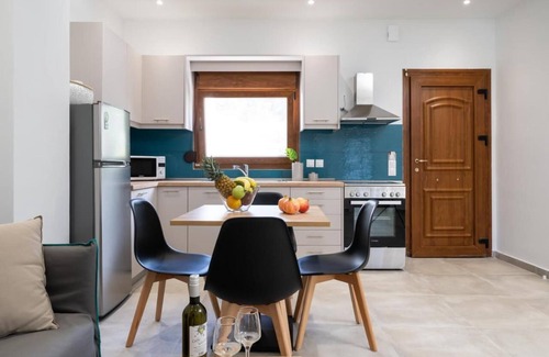 Almiros Beach Apartment | Tranquil Modern Apartments with Pool & Lush Garden close to the Beach and Resort