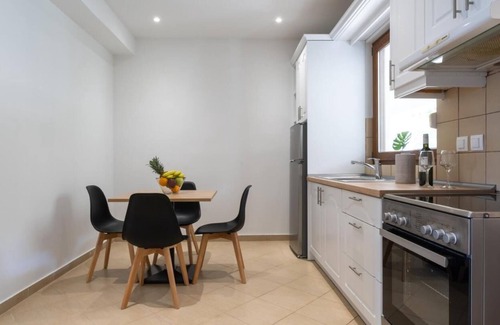Almiros Beach Apartment | Tranquil Modern Apartments with Pool & Lush Garden close to the Beach and Resort