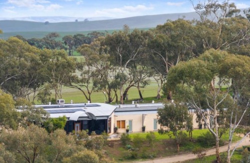 Armagh House | Tranquil motel style large room.